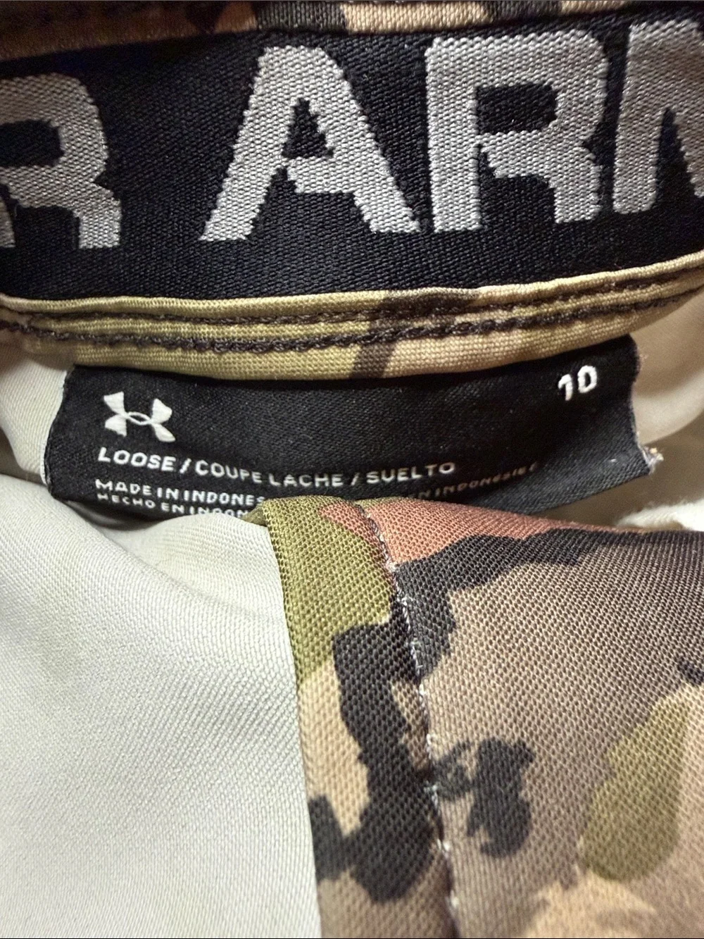 Kid’s Under Armour Storm Camo pants. Size: 10